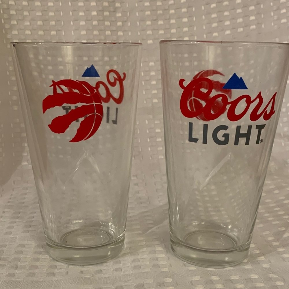 Coors/Raptors glasses, Coors Light logo on one side; Raptors logo on the other.